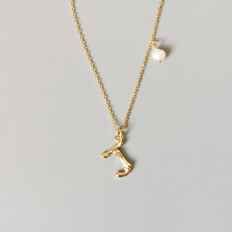 THE LETTER PENDANT NECKLACE