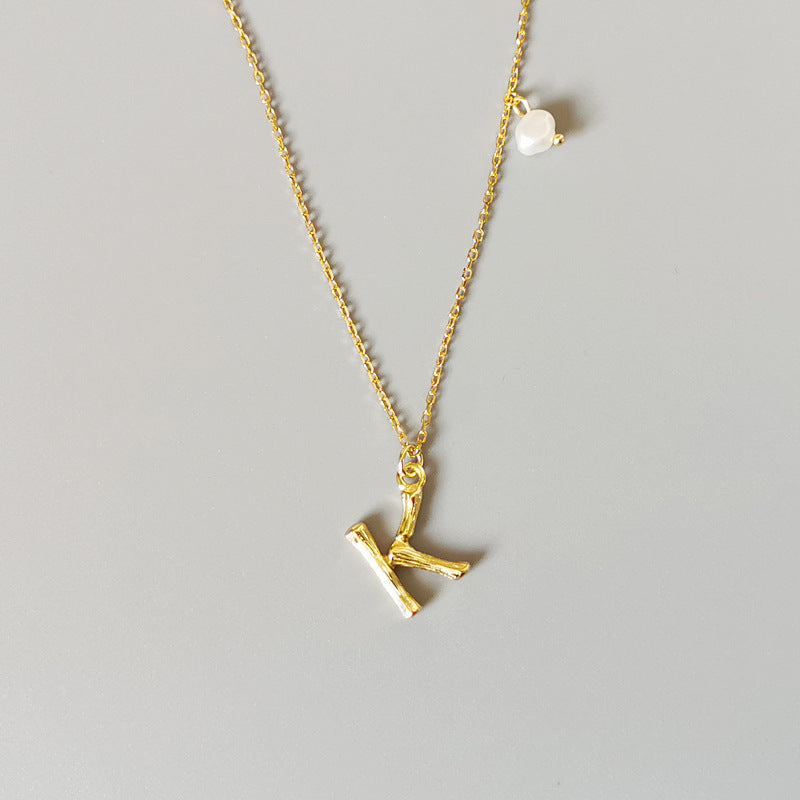 THE LETTER PENDANT NECKLACE
