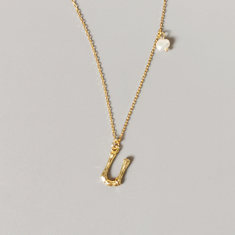 THE LETTER PENDANT NECKLACE
