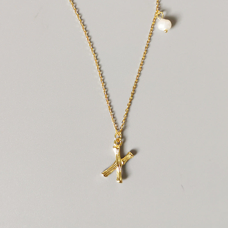 THE LETTER PENDANT NECKLACE
