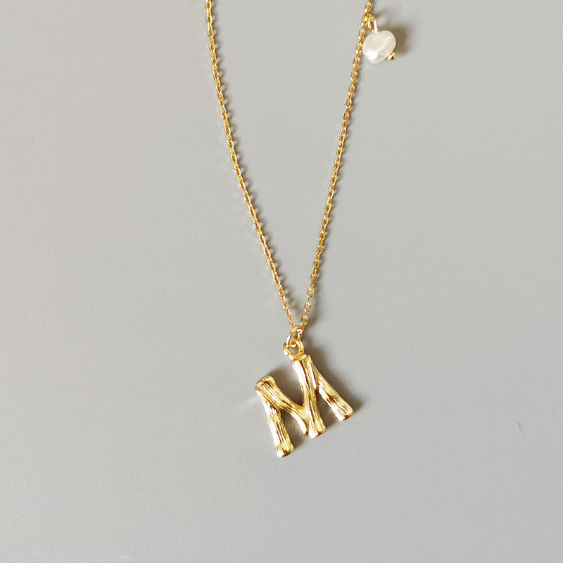 THE LETTER PENDANT NECKLACE